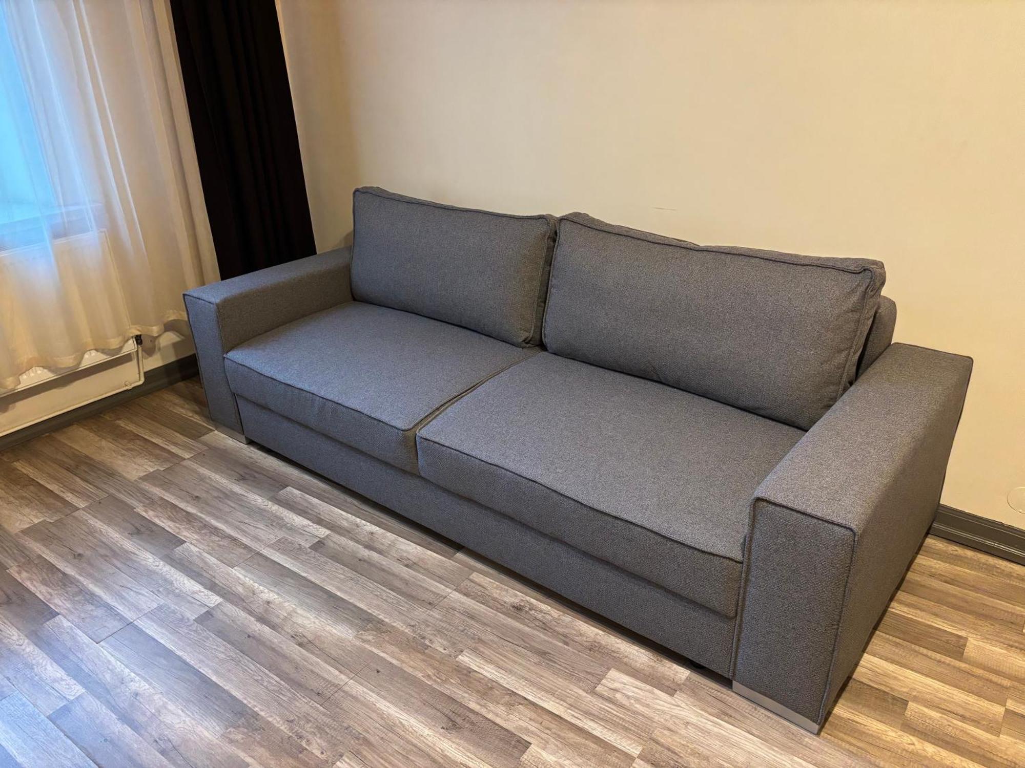 Aparthotel リガ エクステリア 写真 A sofa