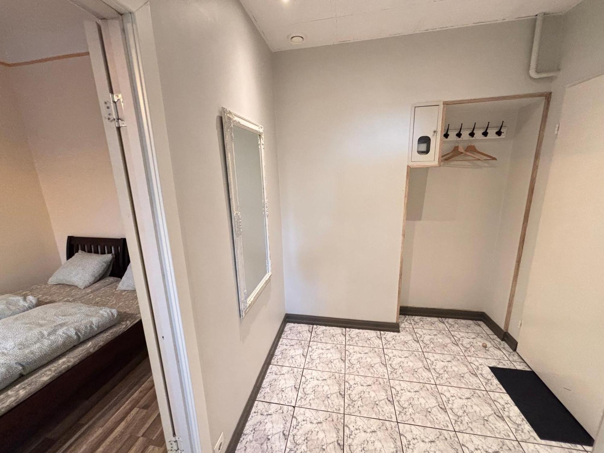 Aparthotel リガ エクステリア 写真 A typical room at the hostel