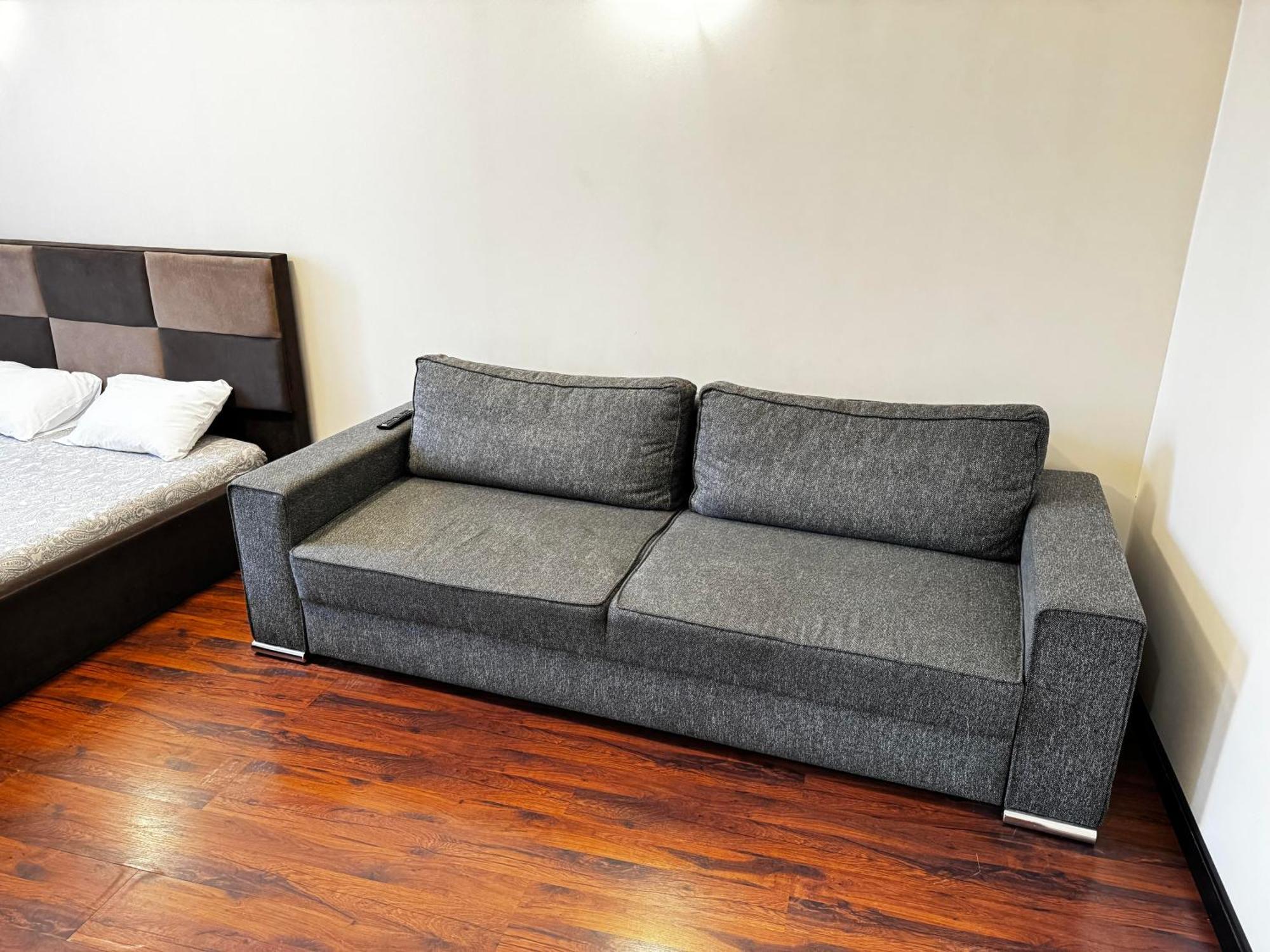Aparthotel リガ エクステリア 写真 A sofa bed